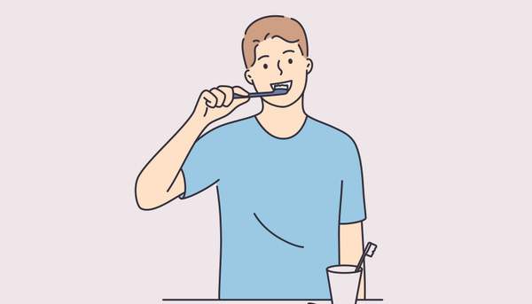 歯ブラシを使って歯磨きをしているイメージ